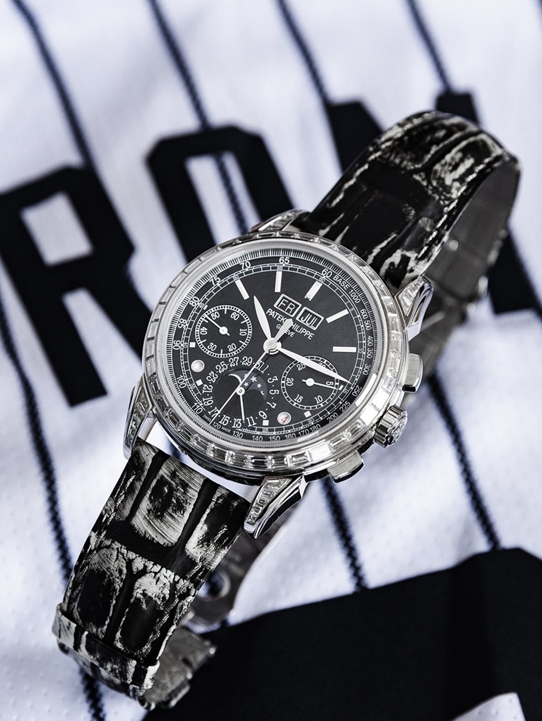 Patek Philippe Grand Complications Ref. 5271P in platinum, featuring a black lacquered dial and ....
